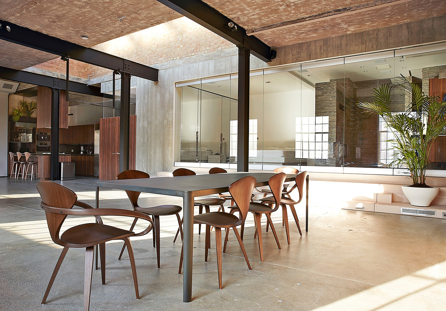 warehouse location with concrete floor, exposed brick and mid-century style